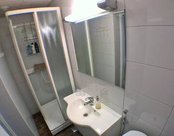 Фото номера Бюджетный двухместный номер с 1 кроватью или 2 отдельными кроватями Отель Vääksyn Apteekinmajoitus г. Ваакси 3